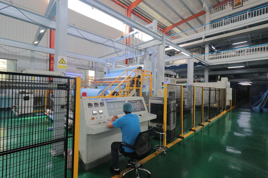 Xinyang Yihe Non-Woven Co., Ltd. linea di produzione del produttore
